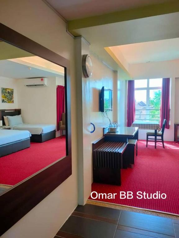 Postel nebo postele na pokoji v ubytování OMAR BB STUDIO