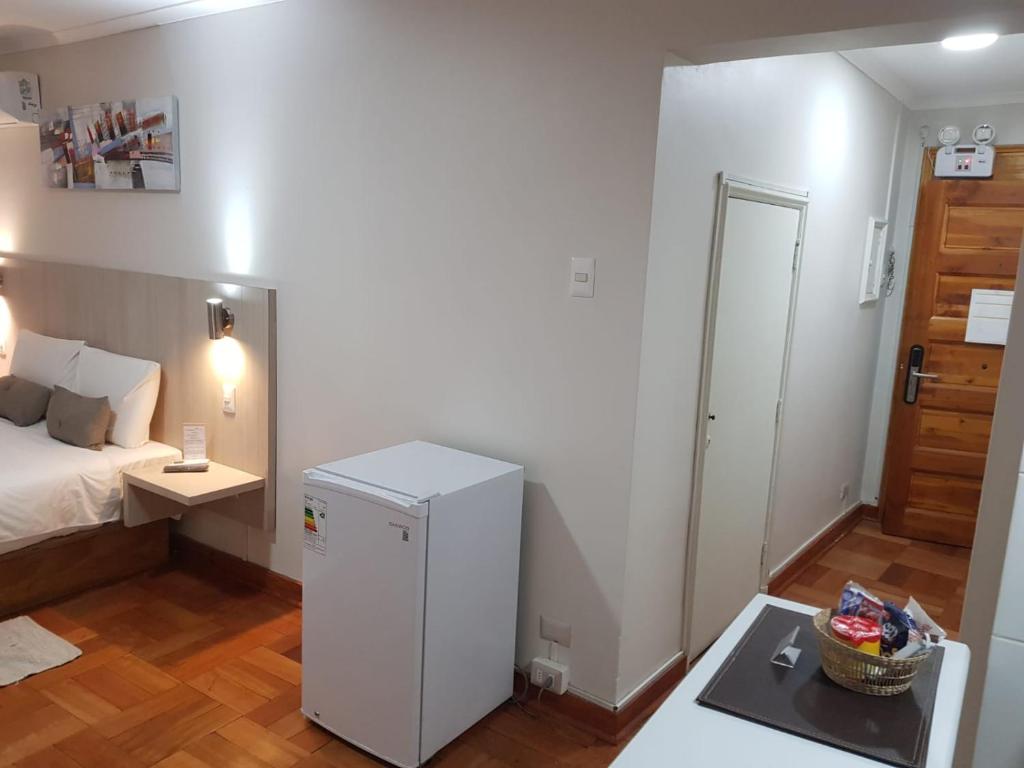 Postel nebo postele na pokoji v ubytování ELDEPTO Parque Bustamante