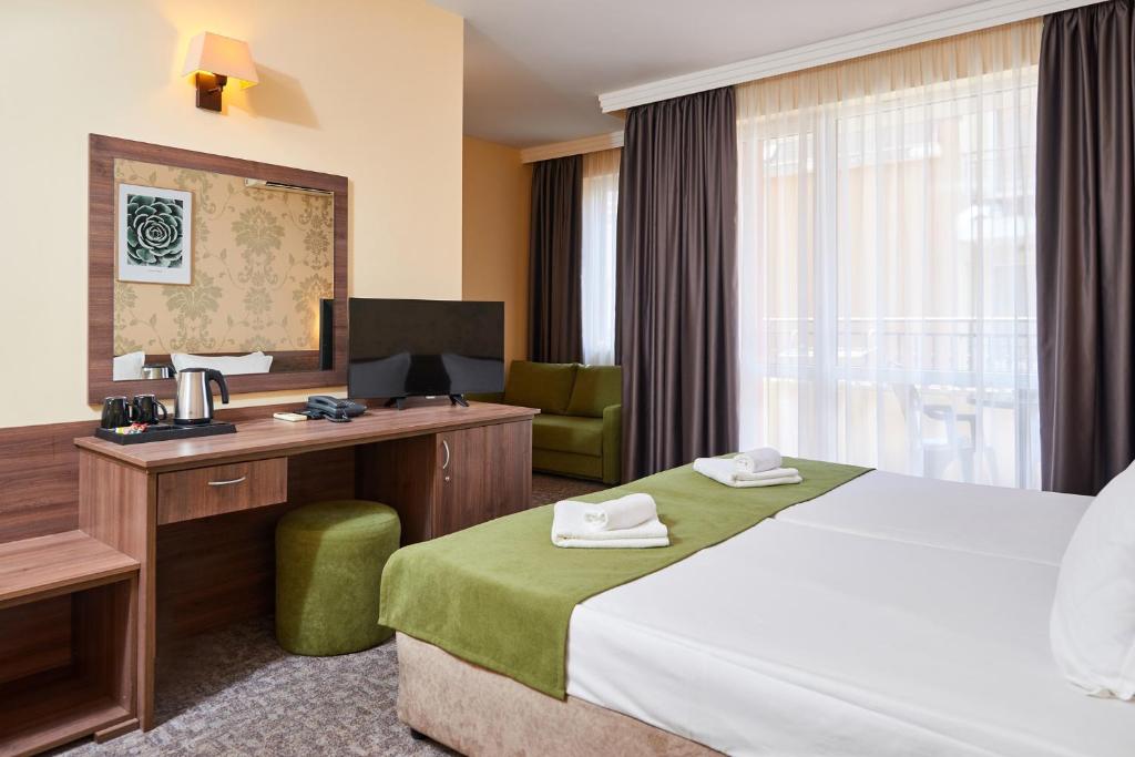 Postel nebo postele na pokoji v ubytování Sunny Beach Hotel Forum - All Inclusive