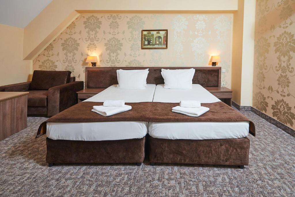 Postel nebo postele na pokoji v ubytování Sunny Beach Hotel Forum - All Inclusive