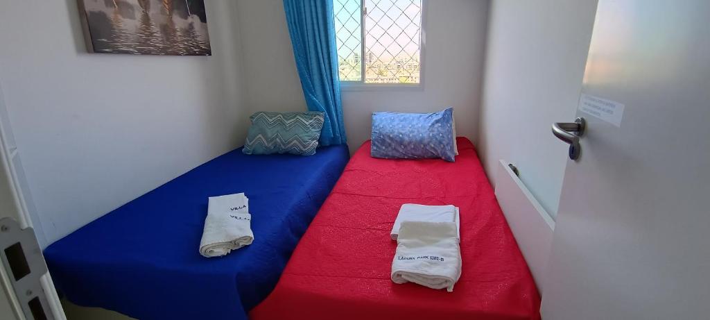 Postel nebo postele na pokoji v ubytování Apartamento 2 quartos novinho vista total Lagoa Maraponga