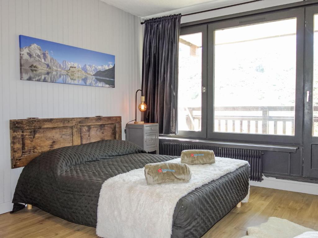 Postel nebo postele na pokoji v ubytování Apartment Le Roc de Peclet by Interhome
