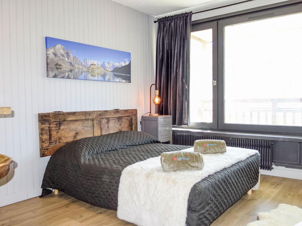 Postel nebo postele na pokoji v ubytování Apartment Le Roc de Peclet by Interhome