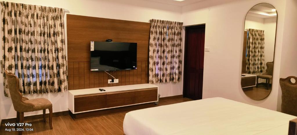Postel nebo postele na pokoji v ubytování Raja Hill Resorts