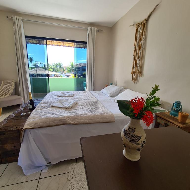 Postel nebo postele na pokoji v ubytování Hotel Real Comandatuba