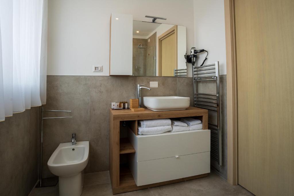 Koupelna v ubytování Hotel Bulà
