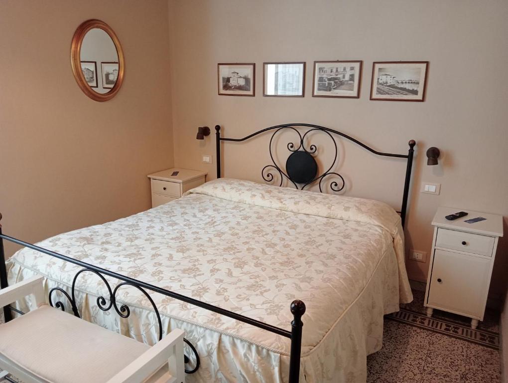 Postel nebo postele na pokoji v ubytování Buonanotte Rooms