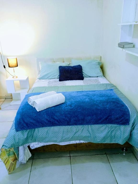 Postel nebo postele na pokoji v ubytování Tacna Guest House