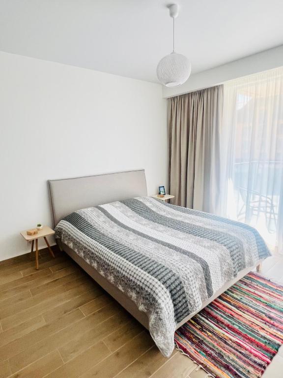 Postel nebo postele na pokoji v ubytování Apres Ski Apartment