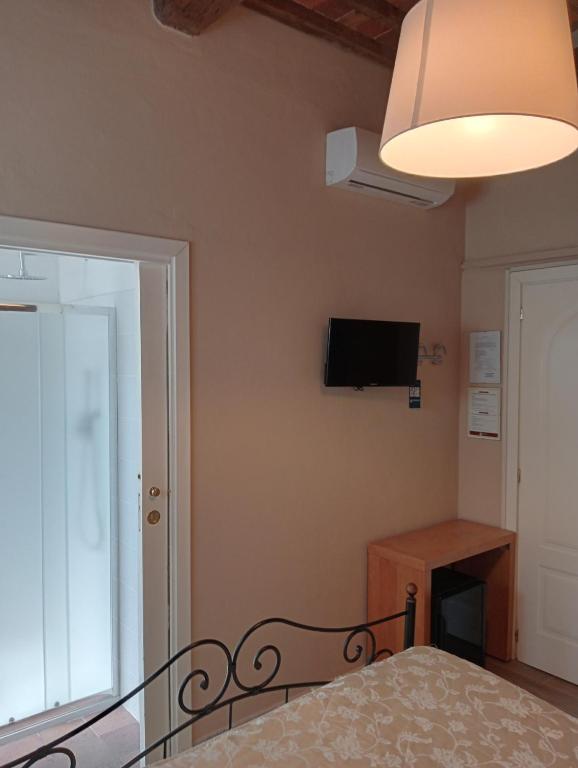 TV a/nebo společenská místnost v ubytování Buonanotte Rooms