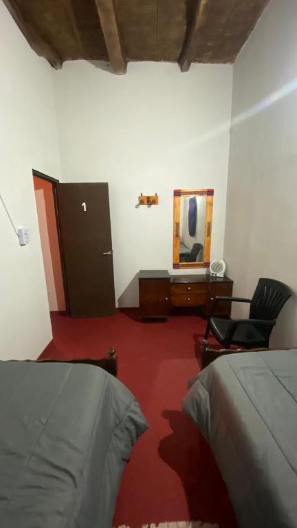 Posezení v ubytování Intiquilla Hostel