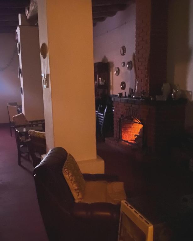 Posezení v ubytování Intiquilla Hostel