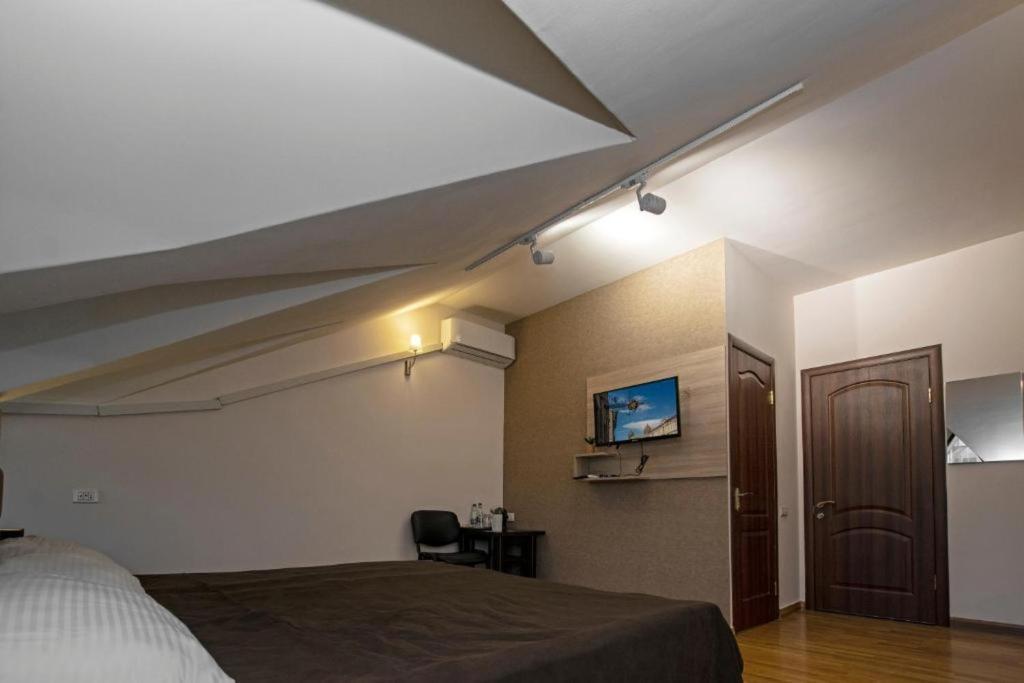 TV a/nebo společenská místnost v ubytování Hotel Season