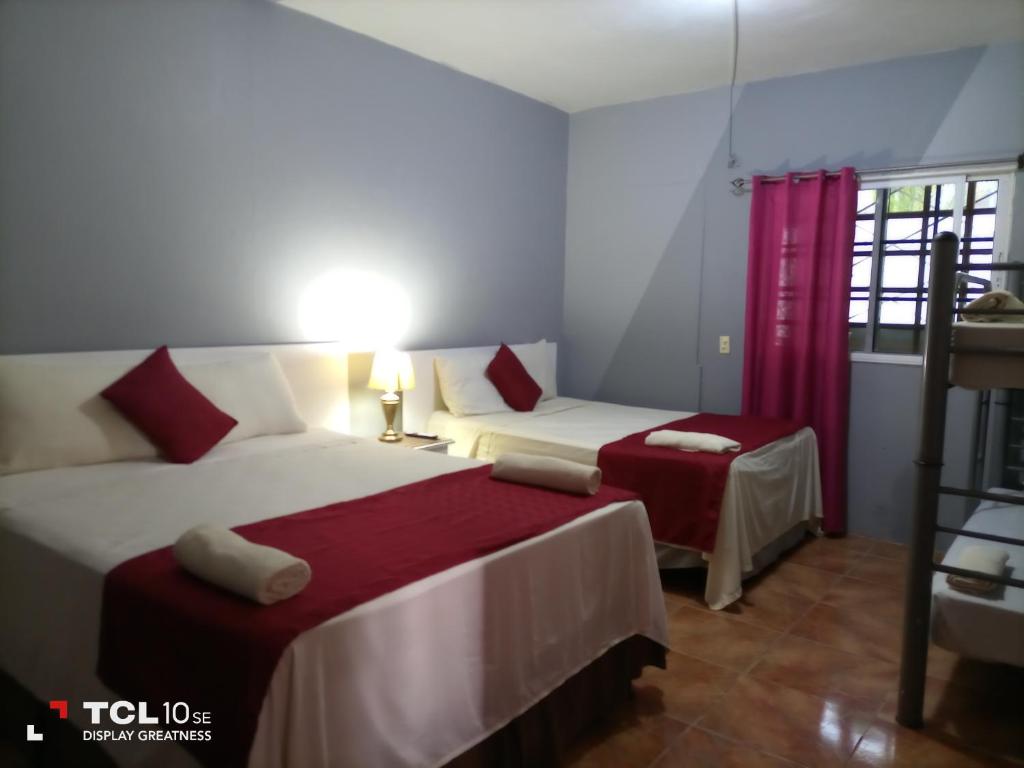 Postel nebo postele na pokoji v ubytování Hotel Vista del Mar