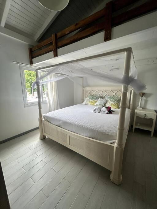 Postel nebo postele na pokoji v ubytování L'etoile de grand case