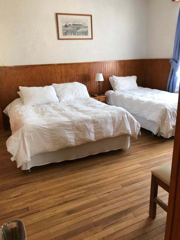 Postel nebo postele na pokoji v ubytování CHALET CHAPITAL Punta Arenas