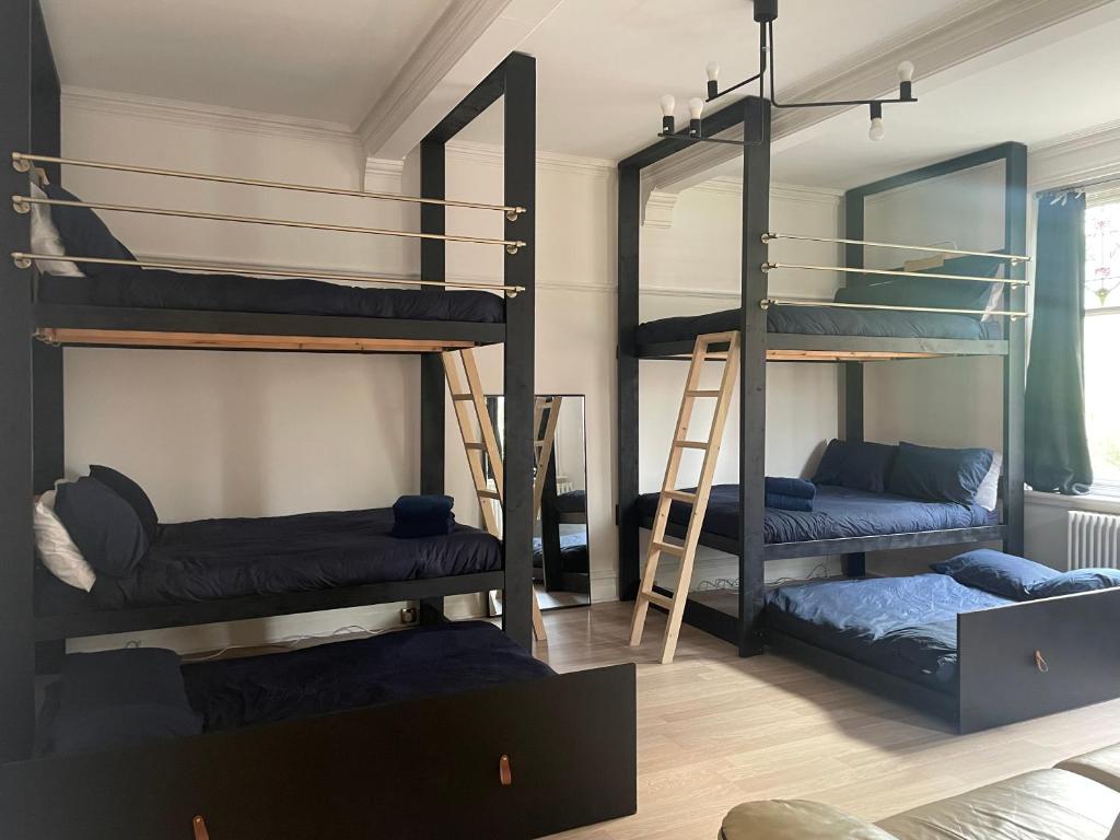 Postel nebo postele na pokoji v ubytování Greeba Manor