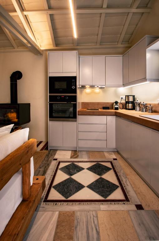 Kuchyň nebo kuchyňský kout v ubytování Byzantino Boutique Hotel