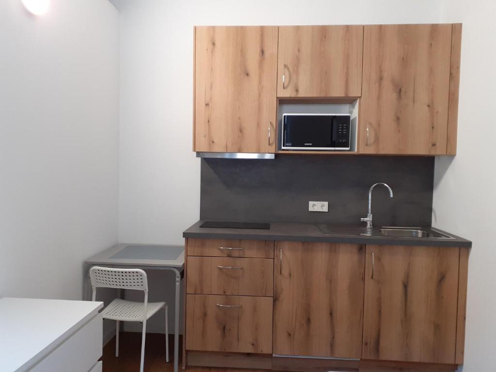 Kuchyň nebo kuchyňský kout v ubytování Studio near to the City Centre