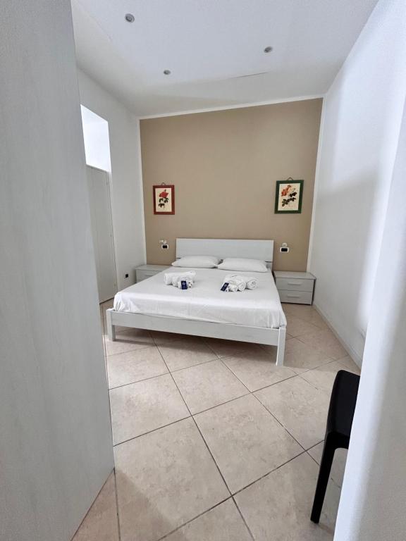 A bed or beds in a room at Leam Apartment 5