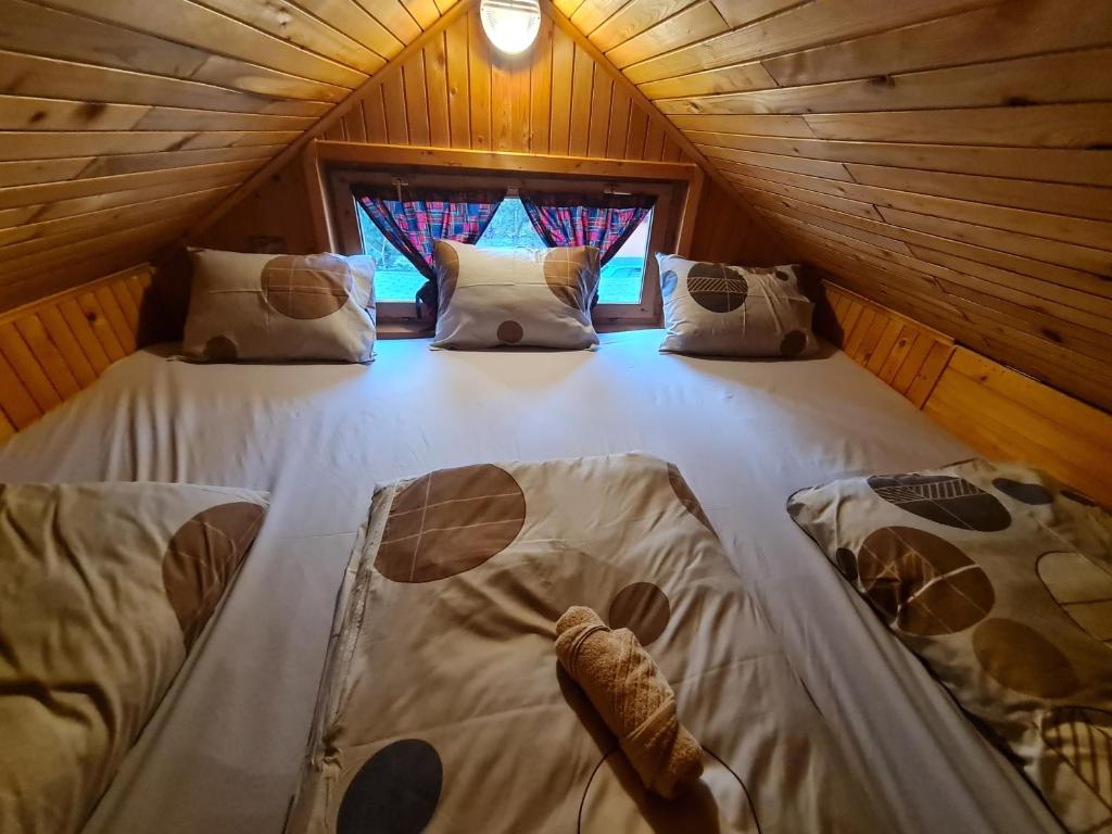 Postel nebo postele na pokoji v ubytování Planinska kuca Ella