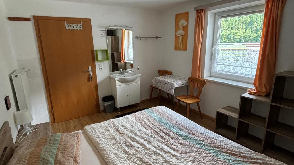 Posteľ alebo postele v izbe v ubytovaní Ferienhaus Dankl