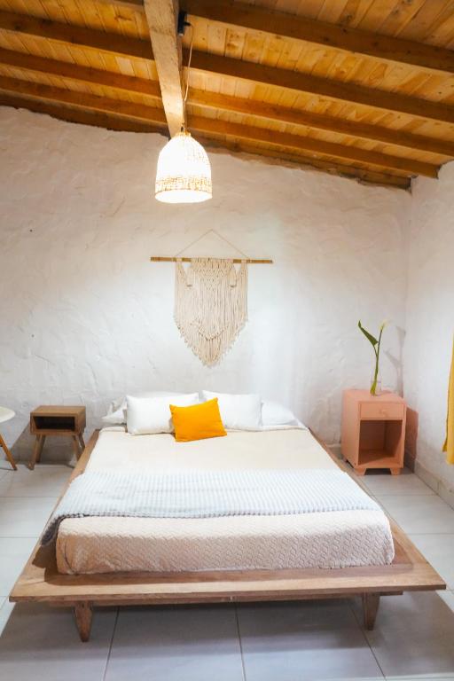 Postel nebo postele na pokoji v ubytování Casa Profunda - Santa Elena