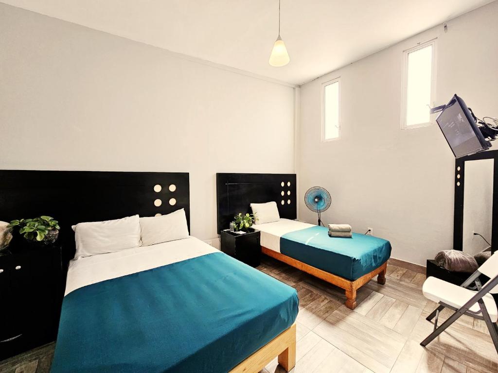 Postel nebo postele na pokoji v ubytování Hotel del Refugio