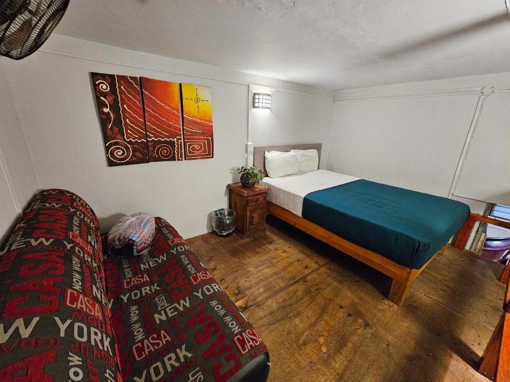 Postel nebo postele na pokoji v ubytování Hotel del Refugio