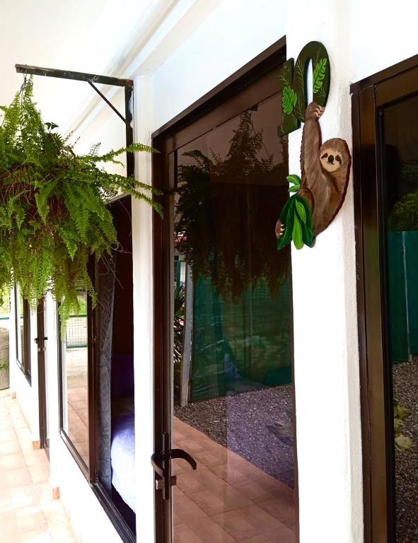 Postel nebo postele na pokoji v ubytování Habitaciones Kolibri