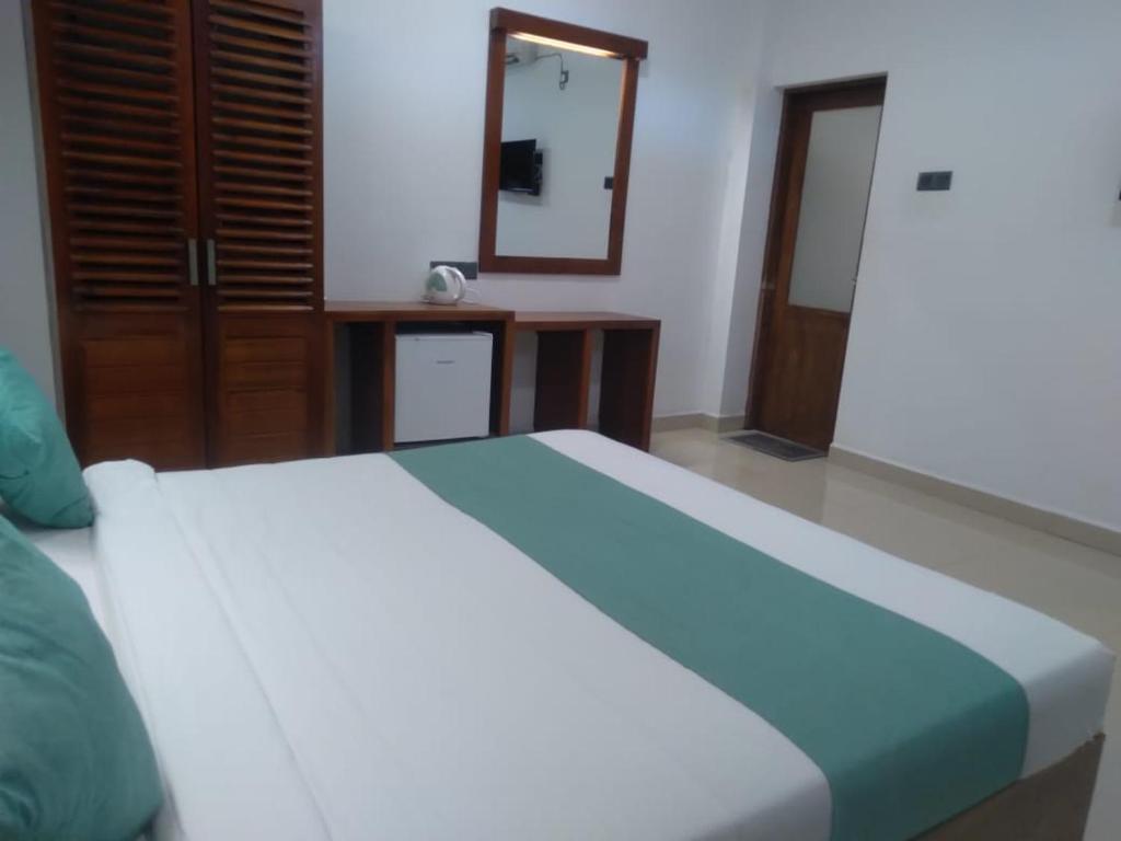 Postel nebo postele na pokoji v ubytování Kudila Resort