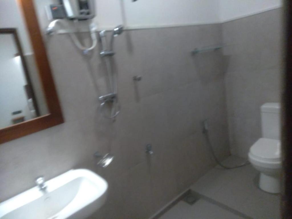 Koupelna v ubytování Kudila Resort