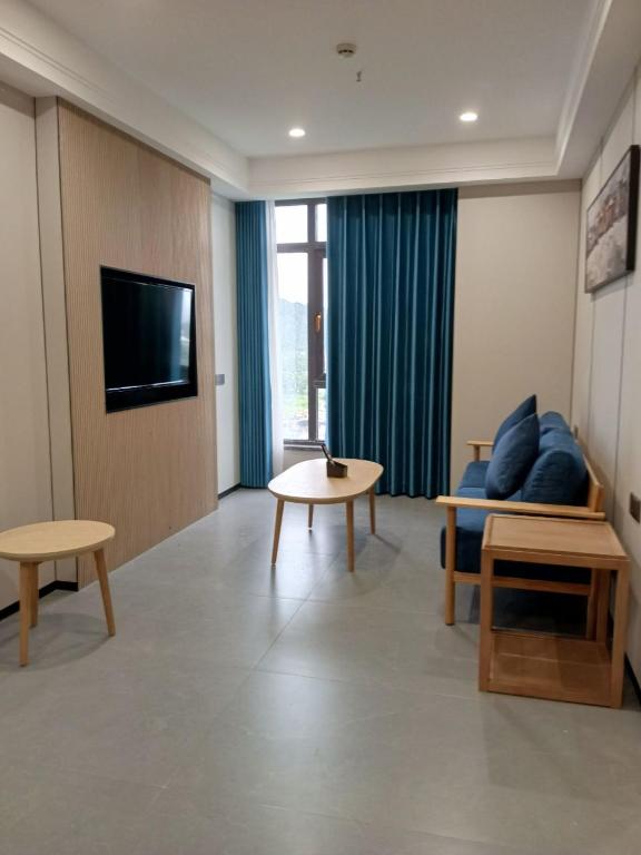 TV a/nebo společenská místnost v ubytování Fan's Hotel Palo
