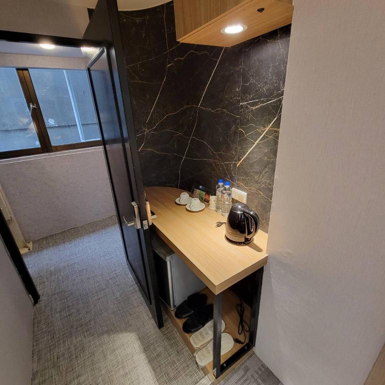 Kuchyň nebo kuchyňský kout v ubytování 雅莊旅館