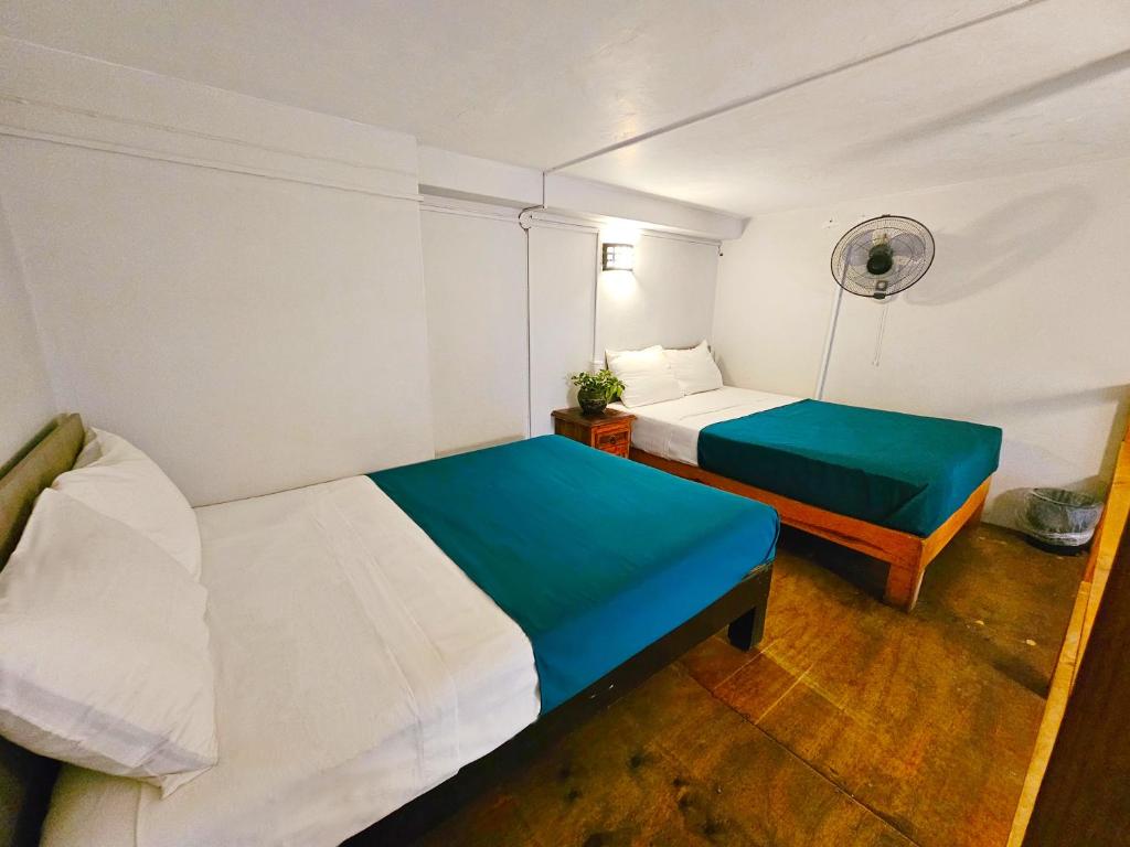 Postel nebo postele na pokoji v ubytování Hotel del Refugio