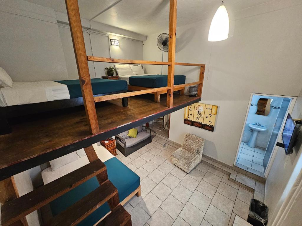 Postel nebo postele na pokoji v ubytování Hotel del Refugio
