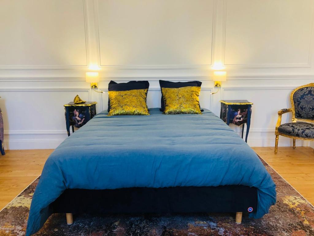 Postel nebo postele na pokoji v ubytování L'Hôtel Particulier du 12