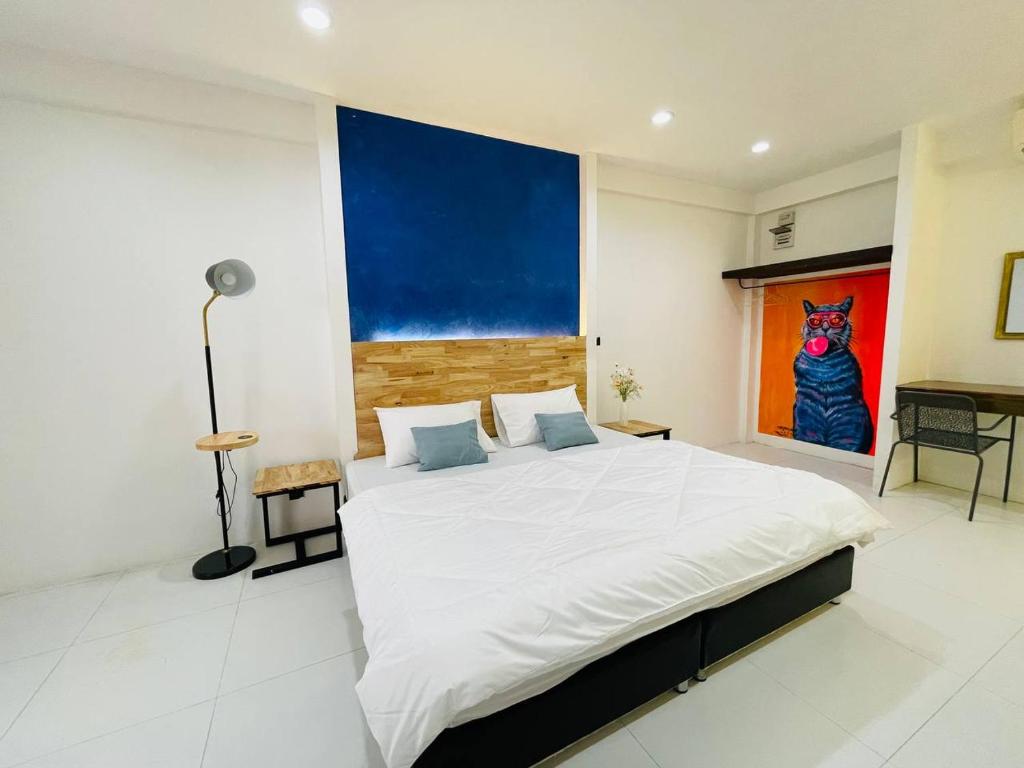 Postel nebo postele na pokoji v ubytování Samui Beach Hostel