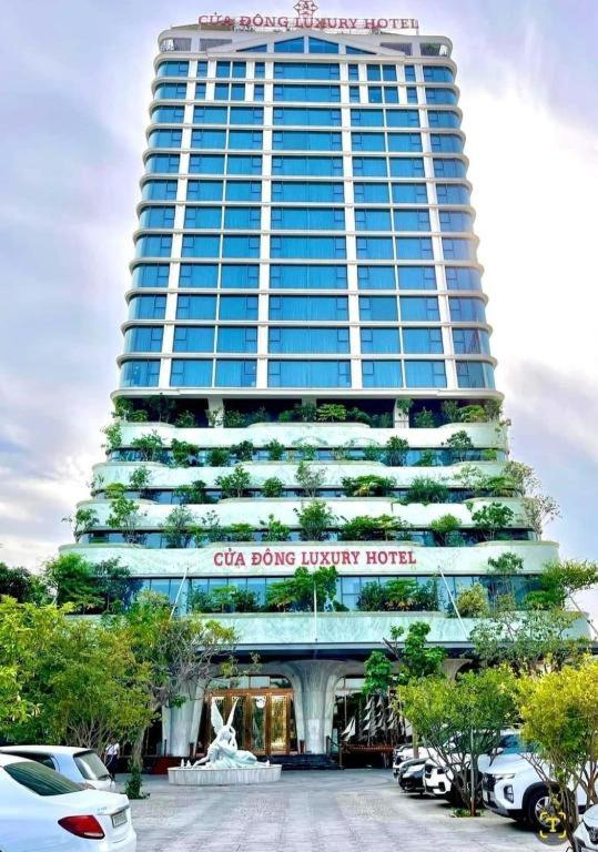 a building with a sign that reads china dome hotel at Cửa Đông Luxury Hotel in Vinh