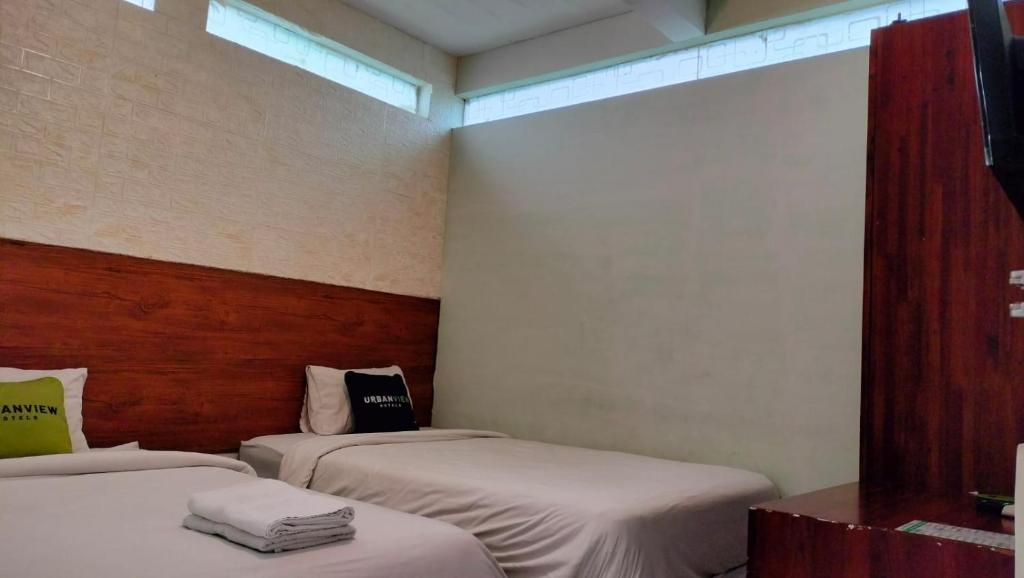 Postel nebo postele na pokoji v ubytování Kozy 15 Guesthouse
