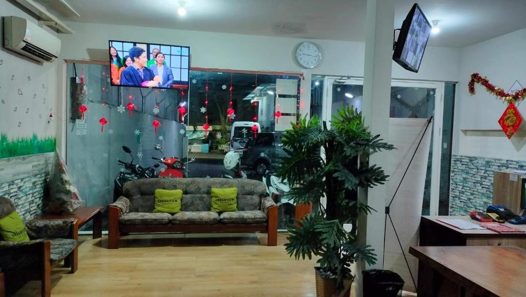 TV a/nebo společenská místnost v ubytování Kozy 15 Guesthouse