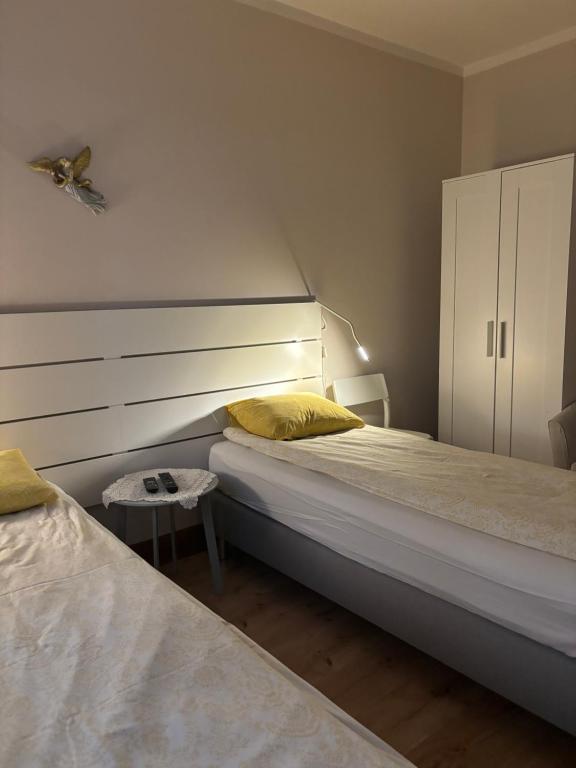 Posteľ alebo postele v izbe v ubytovaní Apartament Józefa
