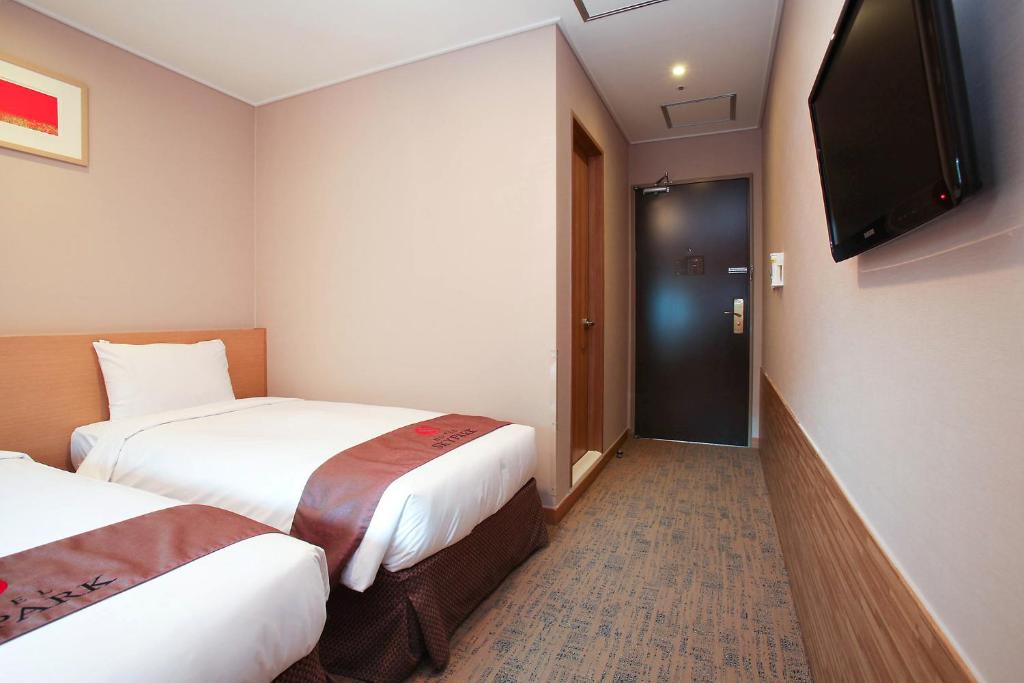 TV a/nebo společenská místnost v ubytování Hotel Skypark Myeongdong 3