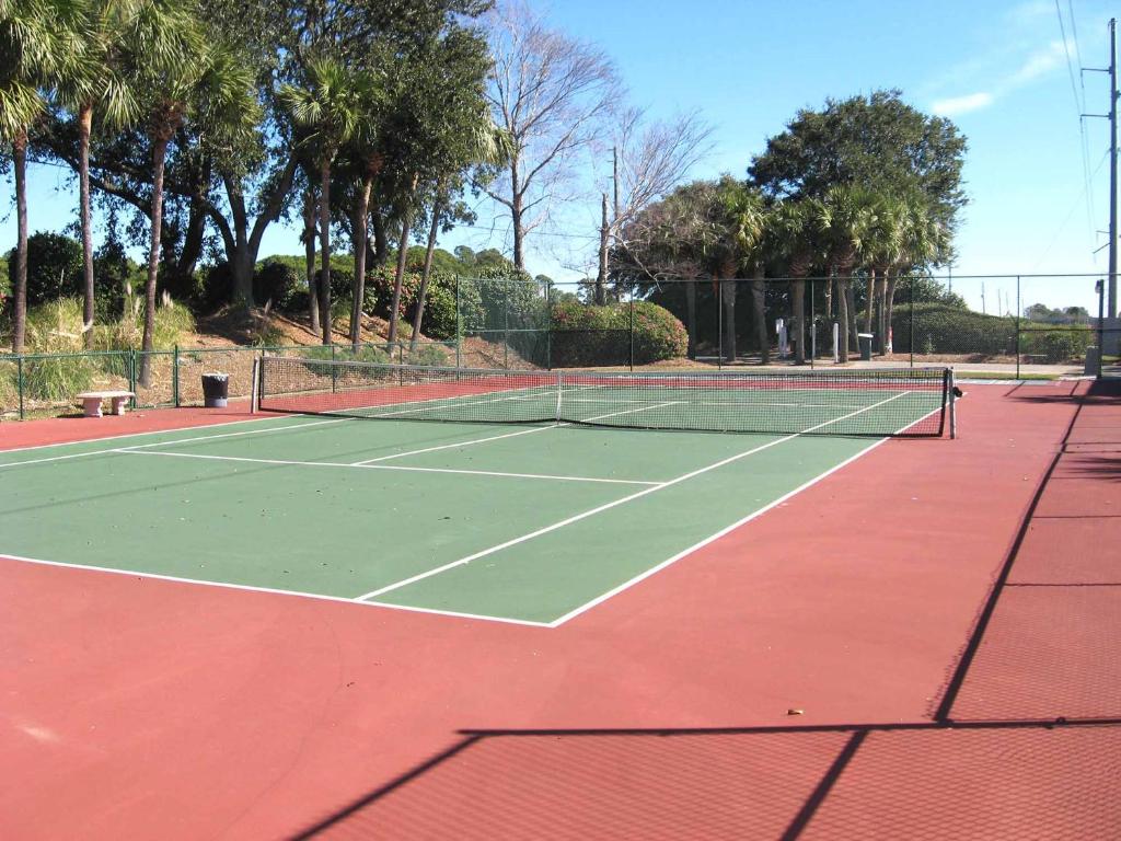 a tennis court with two tennis nets on it at Changes In Latitude in Destin