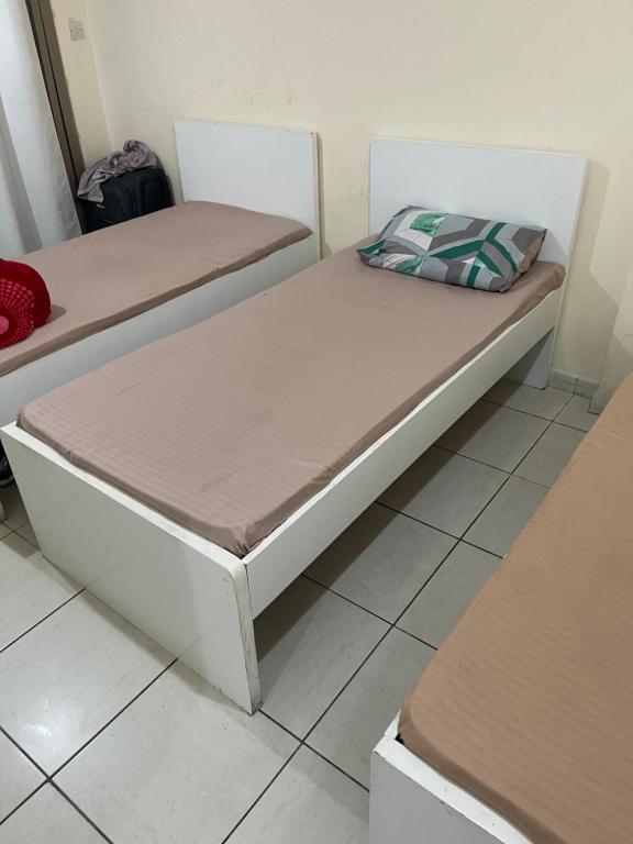 Postel nebo postele na pokoji v ubytování برج المحطة