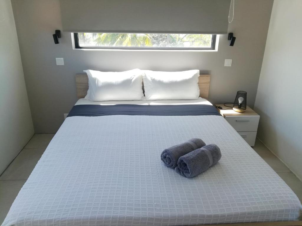 Ένα ή περισσότερα κρεβάτια σε δωμάτιο στο Beach Appartement contemporain
