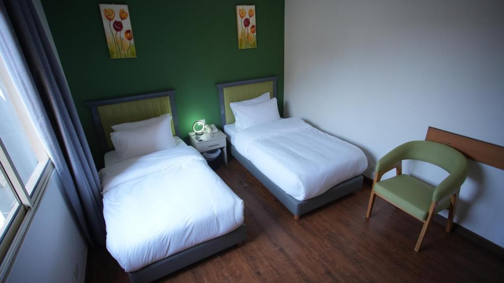 Postel nebo postele na pokoji v ubytování Manara Riva Suites