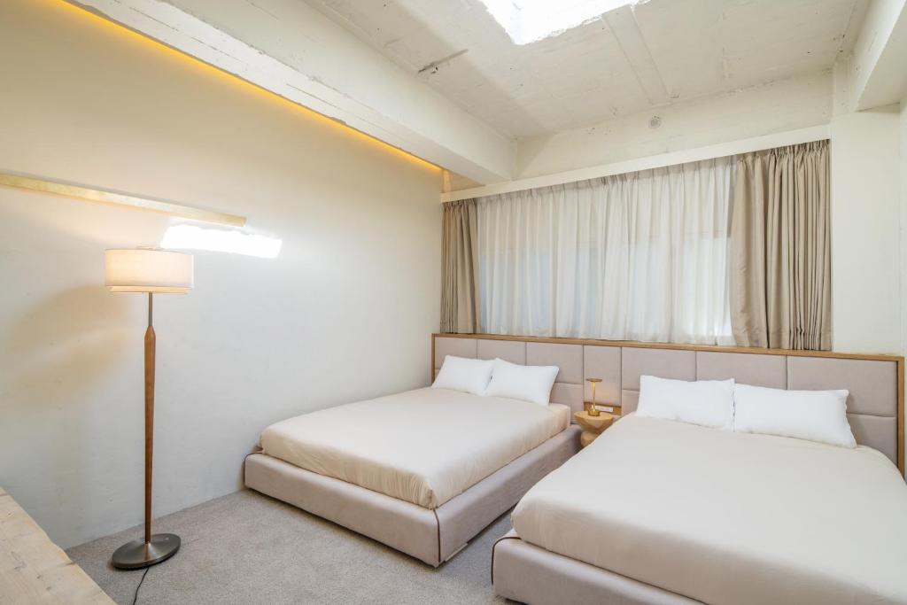 Postel nebo postele na pokoji v ubytování Room Tateyama