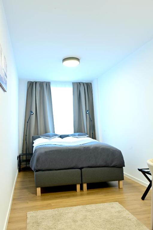 Postel nebo postele na pokoji v ubytování Hotel Grand
