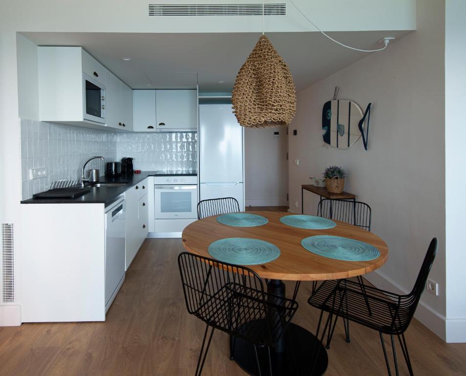 Kuchyň nebo kuchyňský kout v ubytování Hotel Els Pins